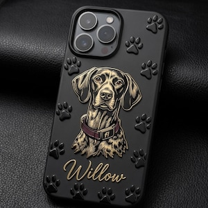 May include: A black smartphone case featuring a raised illustration of a brown dog wearing a purple collar with the text fi. The name Willow is written in gold script below the dog, and the case is decorated with embossed black paw prints.