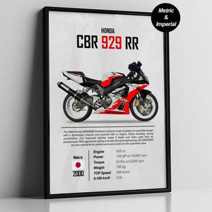 May include: Framed poster featuring a Honda CBR 929 RR motorcycle. The bike is red, white, and black. The poster includes specifications such as engine size, power, torque, weight, and top speed. The poster is in a black frame.