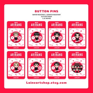 May include: A collection of eight red button pins, each featuring a different illustration of a cartoon character. The pins are 1.25 inches in diameter and have the text "ARIRANG" and "BTS" printed on them. The pins are water resistant and have a glitter finish.