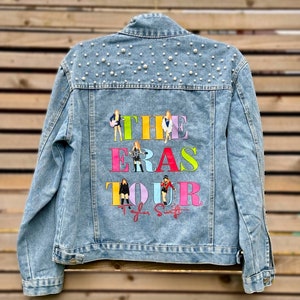 Custom Taylor Eras Tour denim jacket with pearls and surprise tour badge :)