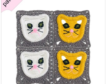 May include: A crochet square pattern featuring four cat faces. Two of the cat faces are white with black eyes and a pink nose. The other two cat faces are yellow with black eyes and a pink nose. The cat faces are surrounded by a gray crochet border.