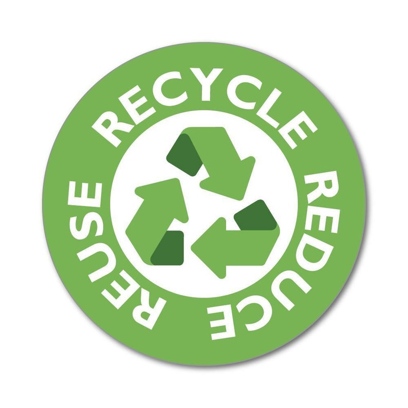 May include: A circular green sticker featuring a white center with a dark green recycling symbol. The words RECYCLE, REDUCE, and REUSE are printed in white capital letters around the perimeter of the green circle in a circular layout.
