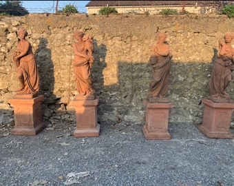 Set of four Terrocatta stone seasons on plinths