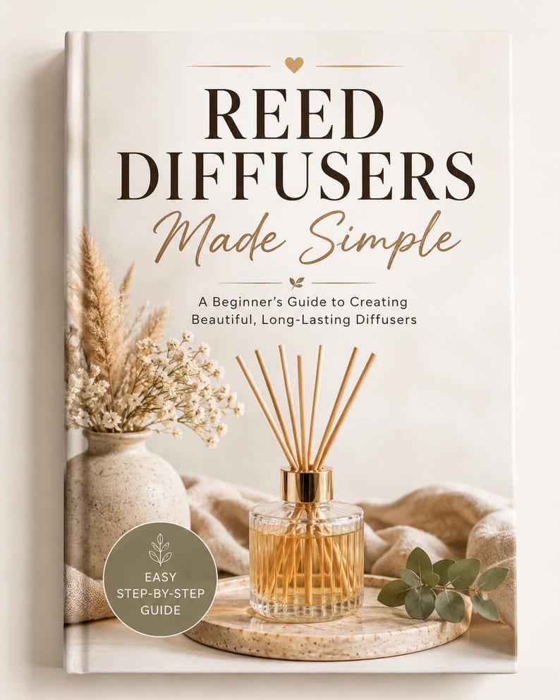 May include: A hardcover book titled REED DIFFUSERS Made Simple, A Beginner's Guide to Creating Beautiful, Long-Lasting Diffusers. The cover features a glass reed diffuser on a speckled plate, a vase with dried flowers, and a circular badge with text.