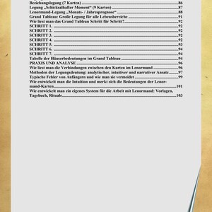 May include: A page from a book with a light beige background featuring a table of contents in German. The text lists various chapters and sections related to Lenormand card reading, including topics like card layouts, analysis, and intuition development.