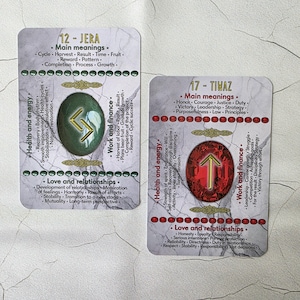 May include: Two tarot cards with detailed text and symbols. One card features a green rune, the other a red rune. The cards have headings like "Health and Energy," "Work and Finance," and "Love and Relationships."
