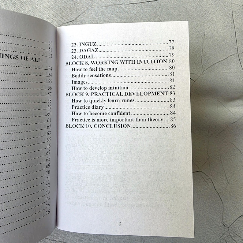 May include: Open book with a detailed table of contents. The page numbers are visible, along with chapter titles such as "Working with Intuition" and "Practical Development." The number "3" is printed at the bottom of the page.