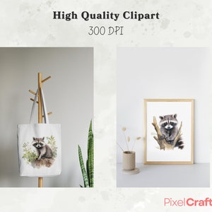 Puede incluir: Una ilustraci&oacute;n de acuarela de un mapache sentado en una rama. La ilustraci&oacute;n est&aacute; enmarcada y se muestra en una pared blanca. La imagen tambi&eacute;n muestra una bolsa de mano con la misma ilustraci&oacute;n de mapache impresa en ella.