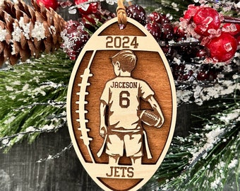 Personalized Flag Football Boy Christmas Ornament with player jersey number, name, team, and year.