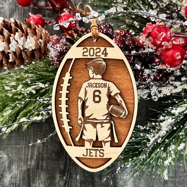 Personalized Flag Football Boy Christmas Ornament with player jersey number, name, team, and year.