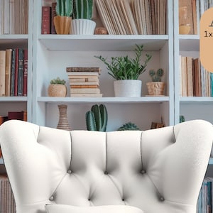 May include: A white armchair with tufted upholstery sits in front of a white bookshelf filled with books and potted plants. The bookshelf has three shelves and is against a white wall. The text "ART" is visible in the upper right corner of the image. The text "1x Zoom Background" is visible below the word "ART". The text "Includes 4 Variations" is visible below the text "1x Zoom Background". The text "1920x1080 pixels (Original)" is visible below the text "Includes 4 Variations". The text "3940x2160 pixels (Original)" is visible below the text "1920x1080 pixels (Original)". The text "1920x1060 pixels (Blurred)" is visible below the text "3940x2160 pixels (Original)". The text "3940x20160 pixels (Blurred)" is visible below the text "1920x1060 pixels (Blurred)".