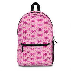 Sac à dos papillon rose cartable motif noeuds sac à dos imperméable durable cadeau pour adolescente mignon cartable tendance sac à dos élégant pour enfants