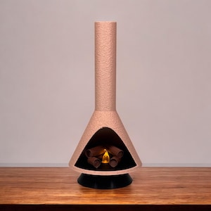 May include: A pink ceramic fireplace with a black base and a glowing orange flame inside. The fireplace is shaped like a cone with a tall chimney.