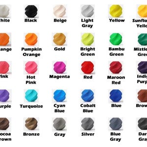 Puede incluir: Una carta de colores con 30 colores diferentes, cada uno mostrado como una peque&ntilde;a esfera texturizada. Los colores van desde el blanco, negro y beige hasta tonos vibrantes como el amarillo, naranja, rosa y verde, con etiquetas.