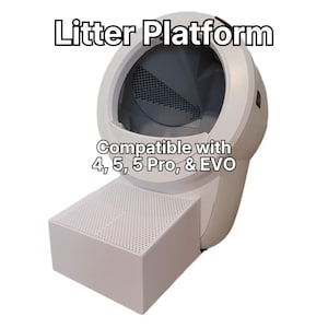 May include: A white plastic litter platform with a perforated top surface attached to a white automatic litter box. The text reads Litter Platform and Compatible with 4, 5, 5 Pro, & EVO. The unit features a circular opening and a grey interior.
