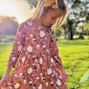 Girls Purple Skeleton Dress with Bow: Halloween Costume Outfit