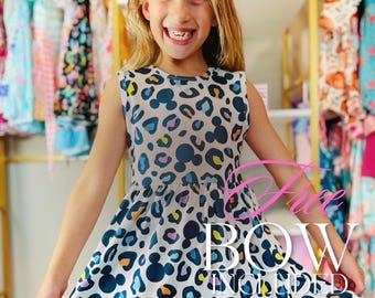 Vestido Animal Kingdom para niña: Conjunto de algodón con estampado de guepardo y lazo