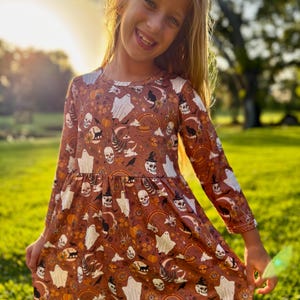 Girls Purple Skeleton Dress with Bow: Halloween Costume Outfit