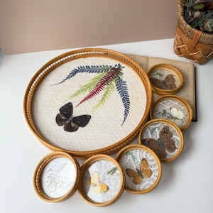 May include: A rustic wooden sign with the text "Welcome to our home" in white lettering. The sign features a distressed finish and a simple, inviting design, perfect for front door decor.