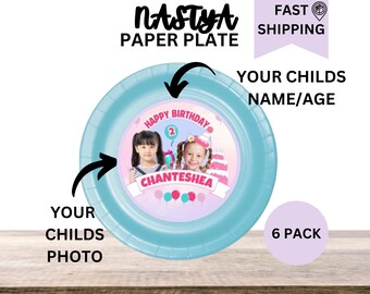 May include: A set of 6 blue paper plates with a pink and white circle in the center. The circle has a picture of two girls, the words "Happy Birthday" and "Chanteshea", and a pink number 2. The text "Your Childs Name/Age" is written above the plate and "Your Childs Photo" is written below the plate.