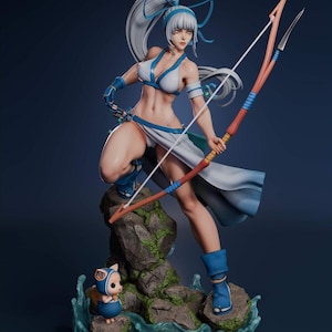 May include: A detailed figurine of a female archer in a dynamic pose, holding a bow and arrow. She wears a white and blue outfit with matching boots. A small, cartoonish creature stands nearby on a rock formation with water effects. The figure has white hair and a determined expression.