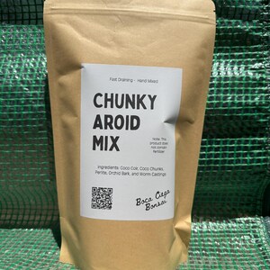 May include: A brown paper bag labelled "CHUNKY AROID MIX" for plants, with a white label listing ingredients such as Coco Coir and Perlite. The bag features the text "Boca Ciega Bonsai" and a QR code.