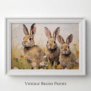 May include: A painting depicting three brown rabbits sitting in a field of colourful wildflowers. The rabbits are looking at the viewer with curious expressions. The background is a soft blue and white.