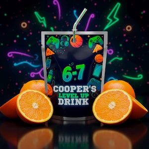 May include: A juice box with a straw, featuring a gaming theme with controllers, pizza, and basketballs. The text reads "6-7" and "COOPER'S LEVEL UP DRINK." Oranges and orange slices are in the foreground against a dark background with neon shapes.