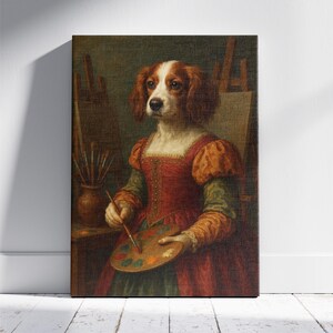 Puede incluir: Impresi&oacute;n art&iacute;stica en lienzo que representa a un perro vestido con atuendo renacentista, sosteniendo un pincel y una paleta. El perro tiene pelaje marr&oacute;n y blanco y viste un vestido rojo y naranja. Un jarr&oacute;n con pinceles y un caballete en el fondo.