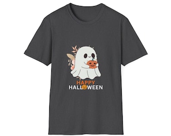 May include: A dark gray short-sleeve t-shirt featuring a graphic of a white ghost holding an orange pumpkin. Behind the ghost are muted pink and brown floral elements. Below the ghost, the text reads HAPPY HALLOWEEN with a pumpkin icon.