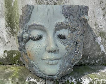 Boho style face sculpture candle