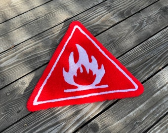 BURN WARNING Rug