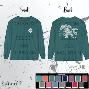 May include: Teal long-sleeve t-shirt with the text "CUSTOM SELECT ANY MOUNTAIN" on the front and a mountain trail map with the text "CUSTOM SELECT ANY MOUNTAIN" on the back. The shirt is available in a variety of colors.