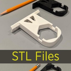 May include: Two 3D printed plastic brackets, one white and one black, are shown next to a pencil. The white bracket is labeled "Flush" and the black bracket is labeled "Extended".  STL Files is written in the middle of the image.