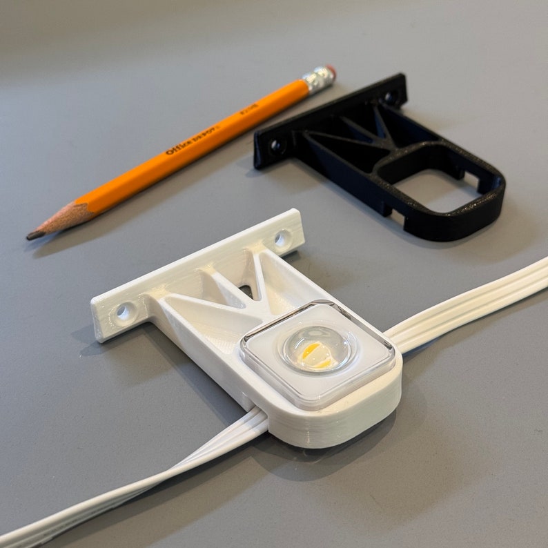 An image showing a light press-fit into an extended mounting bracket for Govee Permanent Outdoor Lights 2