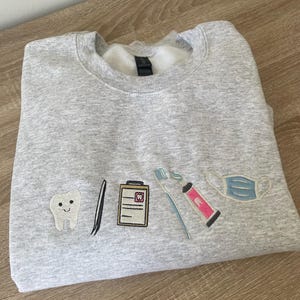 Dental Assistant Sweatshirt | Embroidered Dentist Crewneck for Dental Hygienists | Toothbrush Sweatshirt