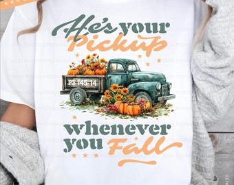 May include: White t-shirt featuring a teal pickup truck filled with pumpkins and sunflowers. The text reads "He's your Pickup whenever you Fall" in teal and orange. The shirt has a fall theme.