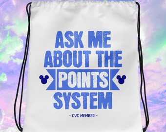 May include: White drawstring bag with blue text that reads "Ask me about the points system - DVC Member -" with a blue Mickey Mouse head on either side of the word "points".