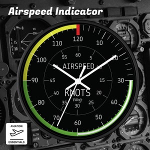 May include: A black and green circular clock with white hands and a black face. The clock face has the words "Airspeed" and "Knots" printed on it. The clock face has a yellow and green arc with numbers from 0 to 120 printed on it.
