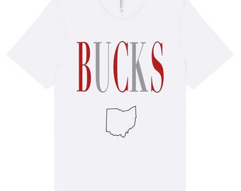 May include: White t-shirt with the word "BUCKS" in red and grey letters and an outline of the state of Ohio in grey.