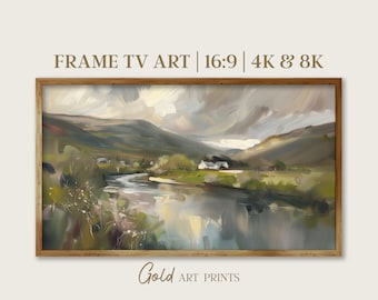 May include: A framed painting of a landscape with a river, green hills, and a white house in the distance. The sky is cloudy and the water is reflecting the light. The frame is a light brown wood. The text "FRAME TV ART | 16:9 | 4K & 8K" is at the top of the image and "Gold ART PRINTS" is at the bottom.