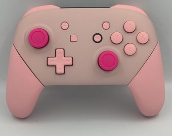 Mando NS Pro personalizado en rosa flor de cerezo y rosa inflado