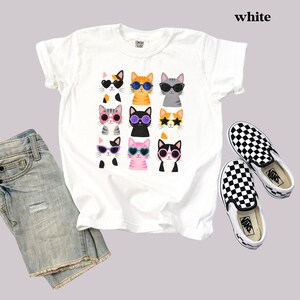 Cute colorful cat shirt featuring playful kitty designs.
Comfort Colors® pet lover t-shirt with cat graphics.
Cat enthusiast shirt with colorful and fun kitty artwork.