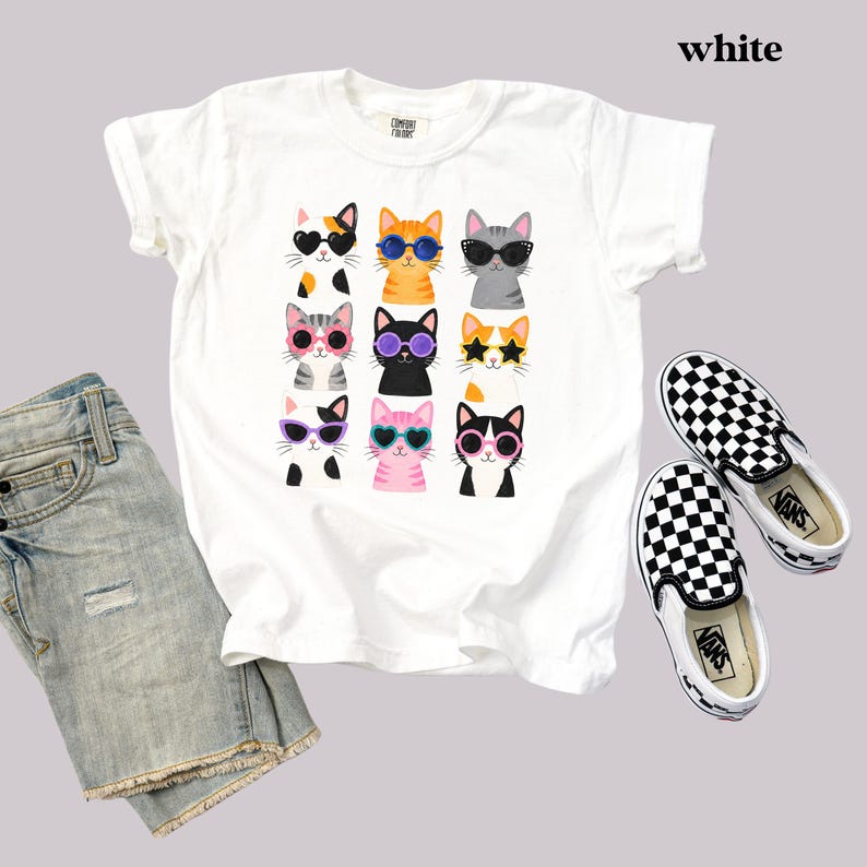 Cute colorful cat shirt featuring playful kitty designs.
Comfort Colors® pet lover t-shirt with cat graphics.
Cat enthusiast shirt with colorful and fun kitty artwork.