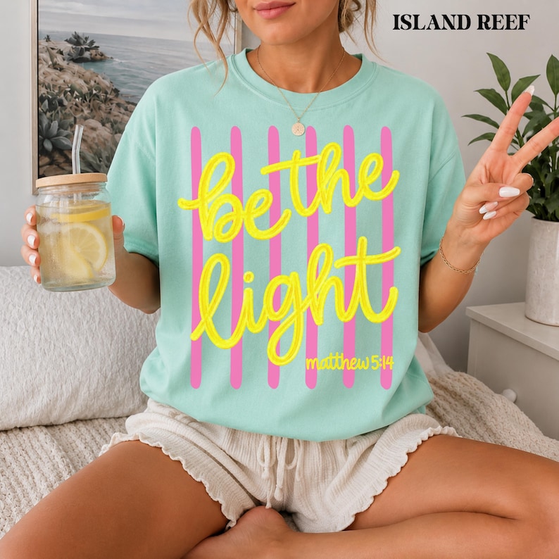 Bible verse t-shirt for women featuring Be the Light design.