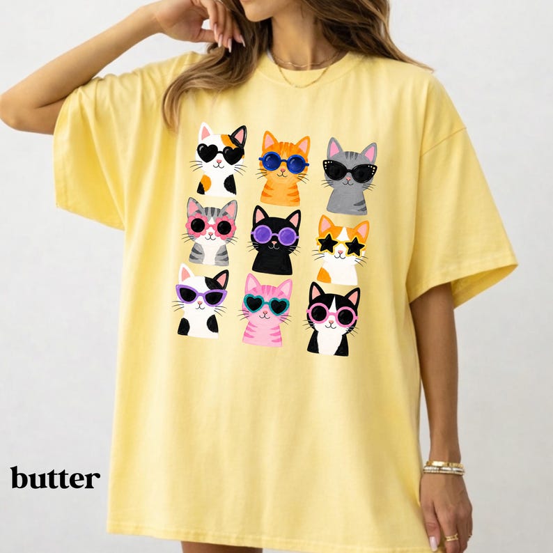Cute colorful cat shirt featuring playful kitty designs.