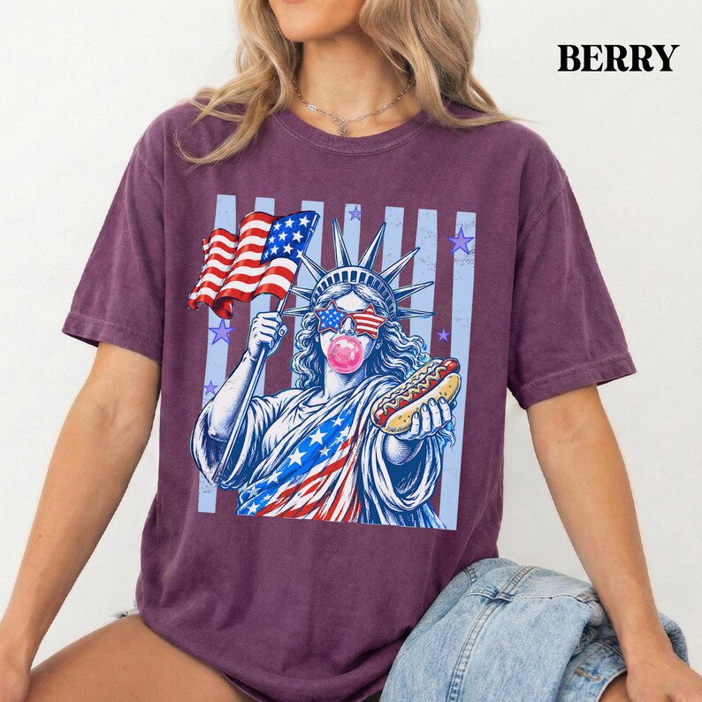 Fourth of July women top with Statue of Liberty, hot dog, and American flag design.