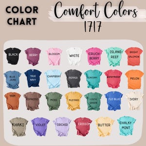 May include: Color chart of Comfort Colors t-shirts in various shades, including black, berry, blossom, white, and cruch berry. Other colors include blue jean, true navy, chambray, pepper, seafoam, watermelon, melon, yam, espresso, moss, mustard, light green, flo blue, ivory, khaki, violet, orchid, crissom, butter, and chalky mint.