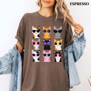 Cat lover t-shirt featuring adorable colorful feline artwork.
