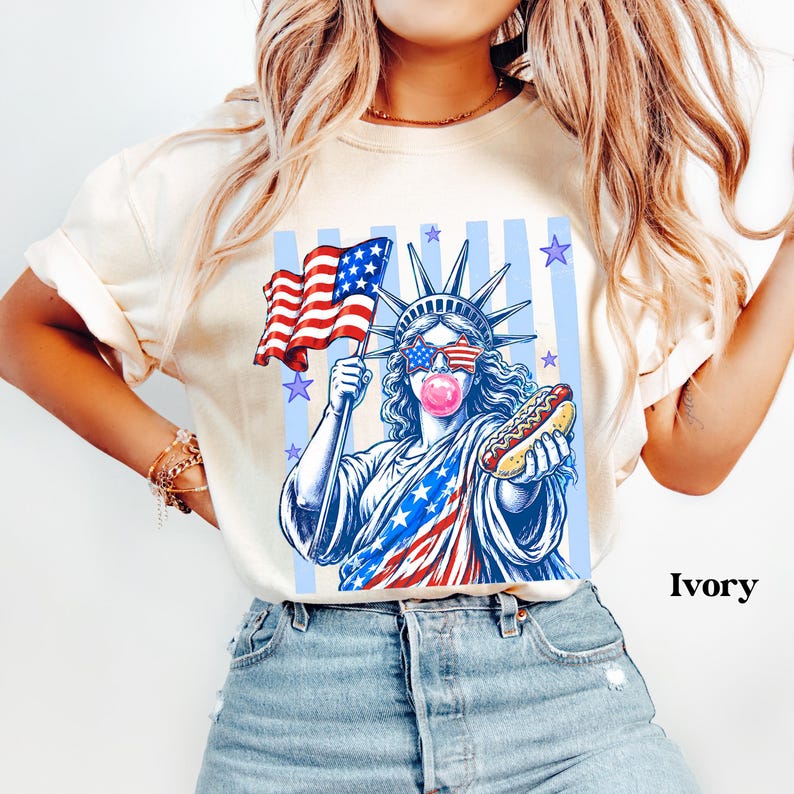 Comfort Colors 4th of July shirt featuring Statue of Liberty with hot dog and bubble gum.